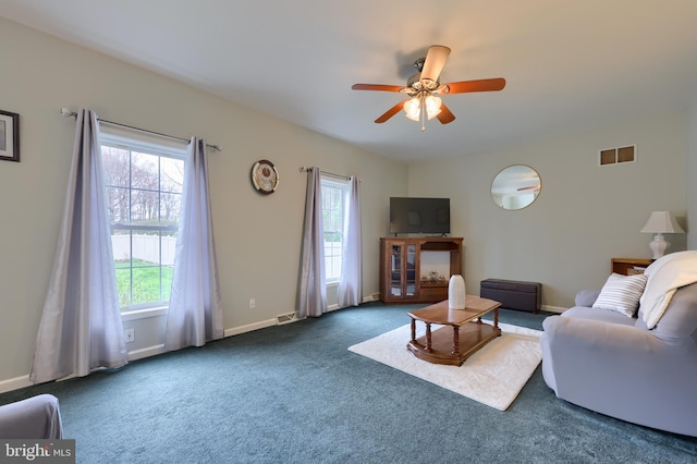 114 Moore Ln, Gap, PA 17527 - carpeted living area featuring a ceiling fan and baseboards