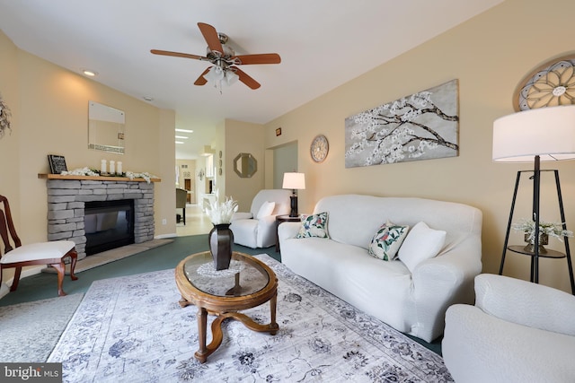 114 Moore Ln, Gap, PA 17527 - carpeted living area featuring a ceiling fan and a stone fireplace