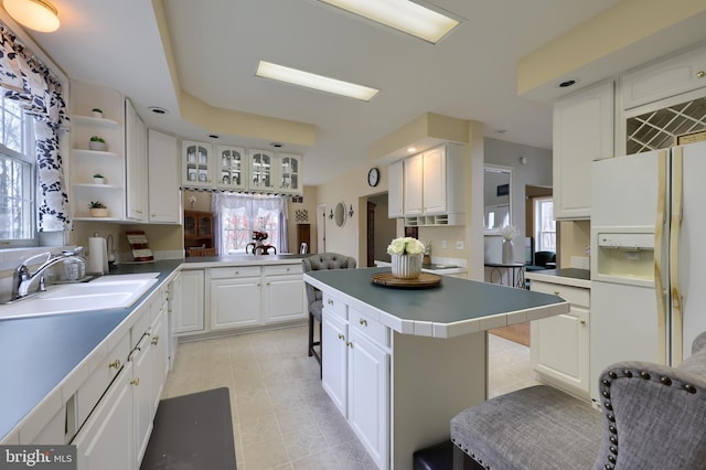 114 Moore Ln, Gap, PA 17527 - kitchen with a sink, white fridge with ice dispenser, plenty of natural light, and white cabinetry
