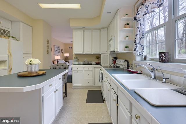 114 Moore Ln, Gap, PA 17527 - kitchen featuring white appliances, a sink, and white cabinets
