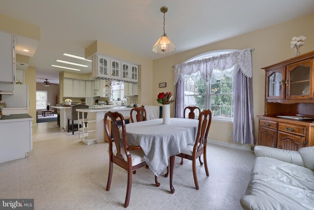 114 Moore Ln, Gap, PA 17527 - dining space with ceiling fan and light tile patterned floors
