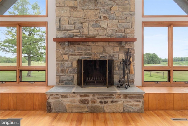12549 Jesse Smith Rd, Mount Airy, MD 21771 - detailed view of wood finished floors and a stone fireplace