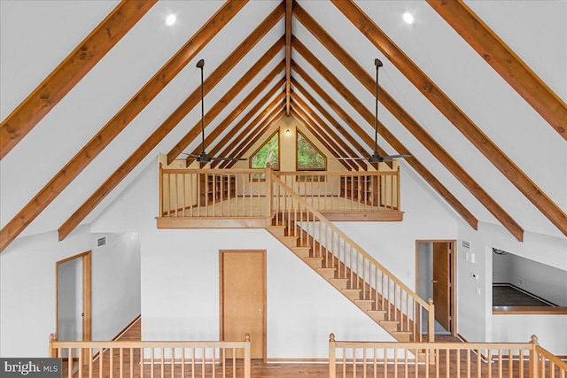 12549 Jesse Smith Rd, Mount Airy, MD 21771 - unfurnished living room featuring high vaulted ceiling, a ceiling fan, beam ceiling, recessed lighting, and stairway