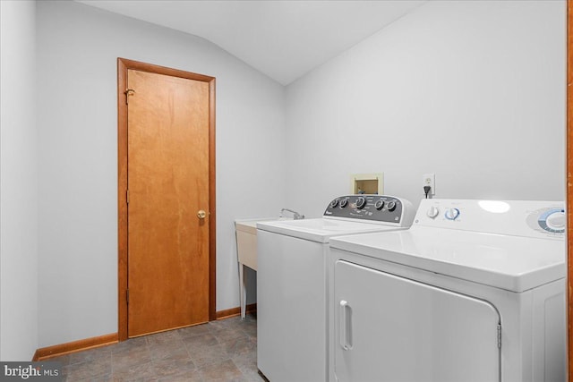 12549 Jesse Smith Rd, Mount Airy, MD 21771 - washroom featuring washing machine and clothes dryer, baseboards, and stone finish flooring