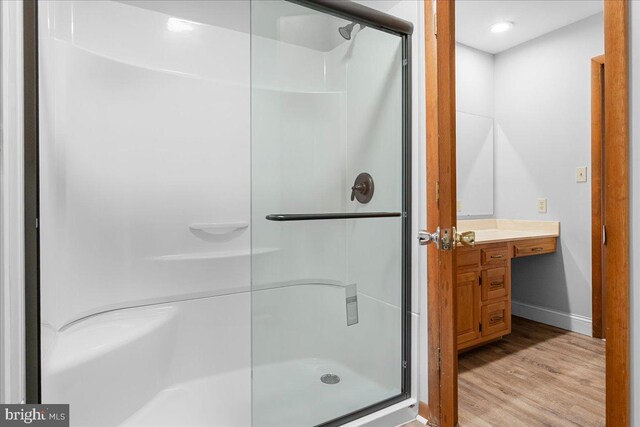 12549 Jesse Smith Rd, Mount Airy, MD 21771 - bathroom featuring a shower stall, wood finished floors, vanity, baseboards, and recessed lighting