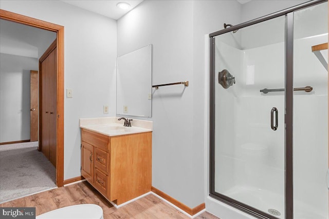 12549 Jesse Smith Rd, Mount Airy, MD 21771 - full bathroom with a shower stall, toilet, vanity, and wood finished floors