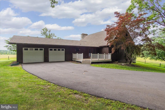 12549 Jesse Smith Rd, Mount Airy, MD 21771 - view of front facade with asphalt driveway, an attached garage, a front yard, and a wooden deck