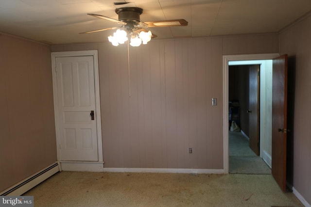 85 S St, Hanover, PA 17331 - spare room featuring a baseboard radiator, light colored carpet, and a ceiling fan