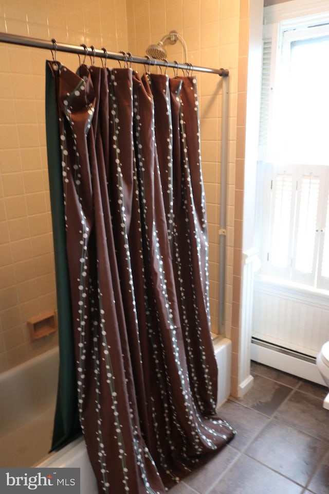 85 S St, Hanover, PA 17331 - bathroom view of a baseboard radiator and shower / bath combination with curtain
