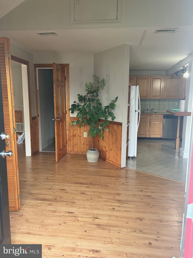17 Barlow Ave, Gloucester City, NJ 08030 - hall featuring light wood-style floors, a wainscoted wall, and a sink