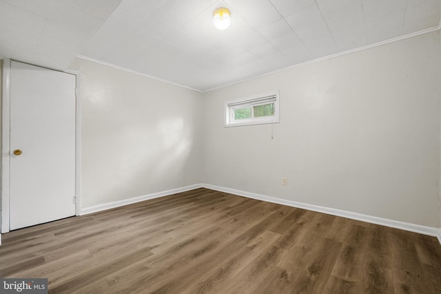 5604 Edgemont Dr, Alexandria, VA 22310 - unfurnished room with crown molding, wood finished floors, and baseboards