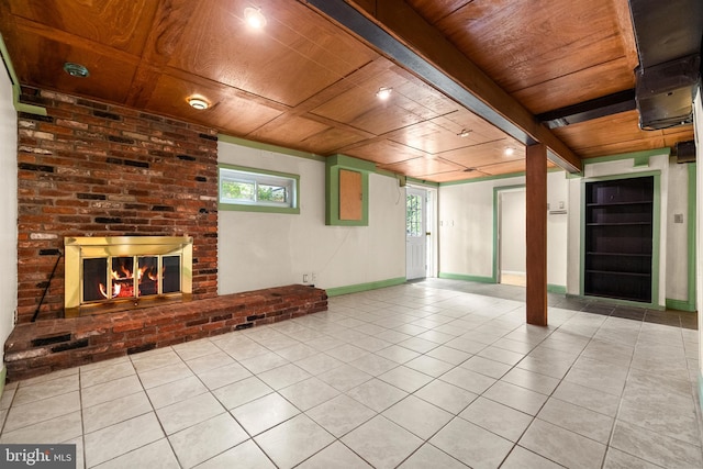 5604 Edgemont Dr, Alexandria, VA 22310 - below grade area with wooden ceiling, baseboards, tile patterned floors, and a brick fireplace