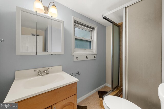 5604 Edgemont Dr, Alexandria, VA 22310 - full bathroom featuring toilet, a shower stall, vanity, and tile patterned flooring