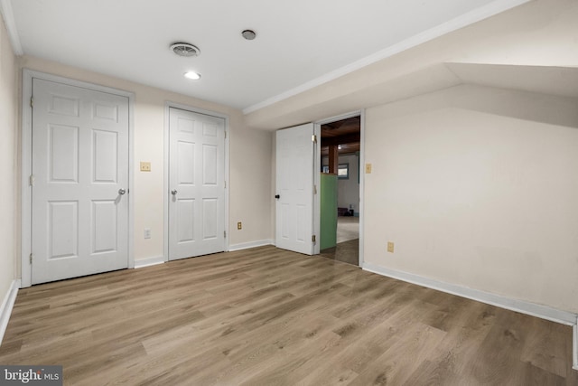 5604 Edgemont Dr, Alexandria, VA 22310 - unfurnished bedroom featuring light wood-style flooring, baseboards, and recessed lighting
