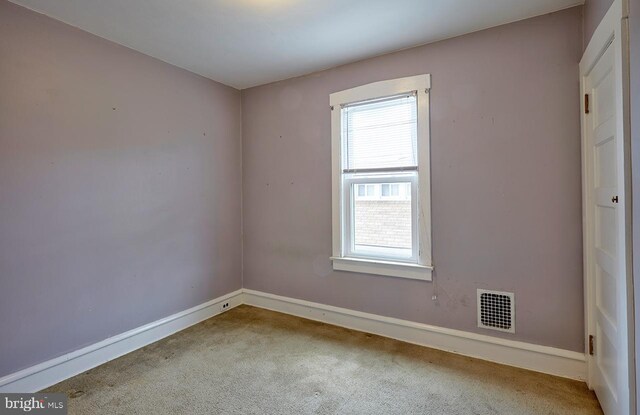 625 Hunter St, Gloucester City, NJ 08030 - carpeted spare room featuring baseboards