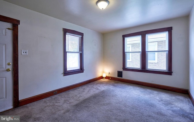 625 Hunter St, Gloucester City, NJ 08030 - carpeted empty room with baseboards
