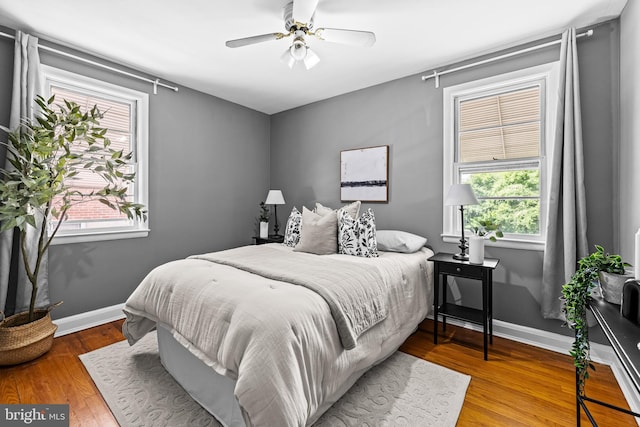 2521 Moore Ave, Baltimore, MD 21234 - bedroom featuring wood finished floors, baseboards, and a ceiling fan
