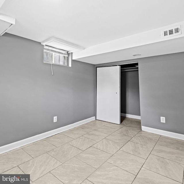 2521 Moore Ave, Baltimore, MD 21234 - unfurnished bedroom with a closet and tile patterned floors