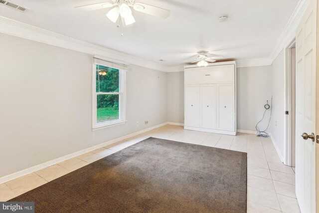 46 Misty Ln, Stafford, VA 22556 - unfurnished bedroom with light tile patterned flooring, crown molding, baseboards, a closet, and ceiling fan