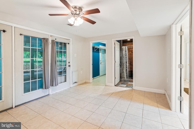 46 Misty Ln, Stafford, VA 22556 - empty room featuring a ceiling fan, light tile patterned floors, and baseboards