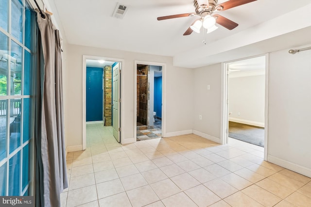 46 Misty Ln, Stafford, VA 22556 - spare room featuring light tile patterned floors, a ceiling fan, and baseboards