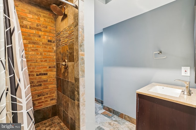 46 Misty Ln, Stafford, VA 22556 - bathroom with tiled shower, vanity, and stone finish floors