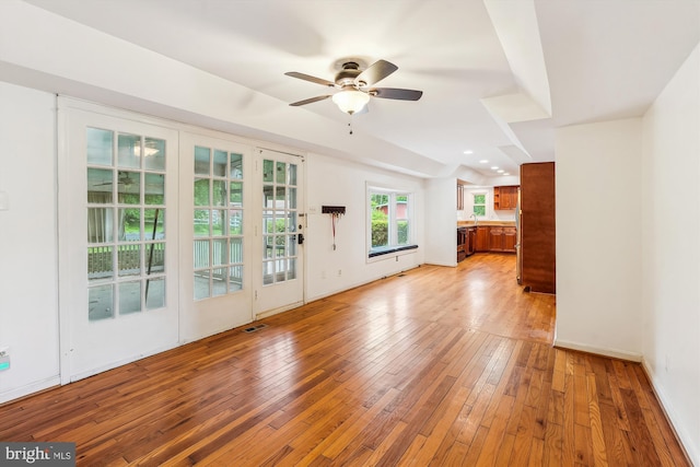 46 Misty Ln, Stafford, VA 22556 - unfurnished living room with a ceiling fan, light wood-style flooring, and baseboards