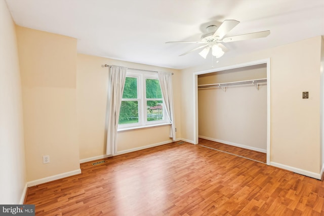 46 Misty Ln, Stafford, VA 22556 - unfurnished bedroom featuring wood finished floors, a closet, baseboards, and ceiling fan