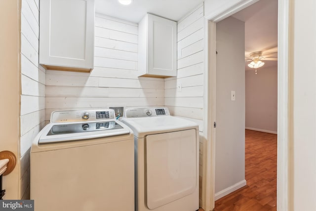46 Misty Ln, Stafford, VA 22556 - laundry area with independent washer and dryer, cabinet space, ceiling fan, wood finished floors, and wood walls
