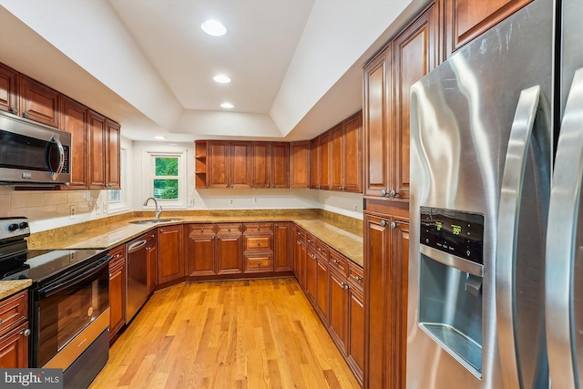 46 Misty Ln, Stafford, VA 22556 - kitchen with stainless steel appliances, a sink, light stone countertops, light wood-type flooring, and recessed lighting