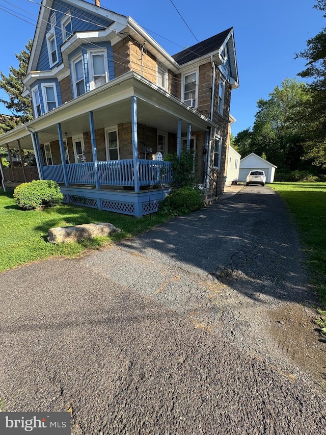73 Fairfield Ave, Lawrence, NJ 08648 - view of front of property featuring covered porch, an outbuilding, and a garage