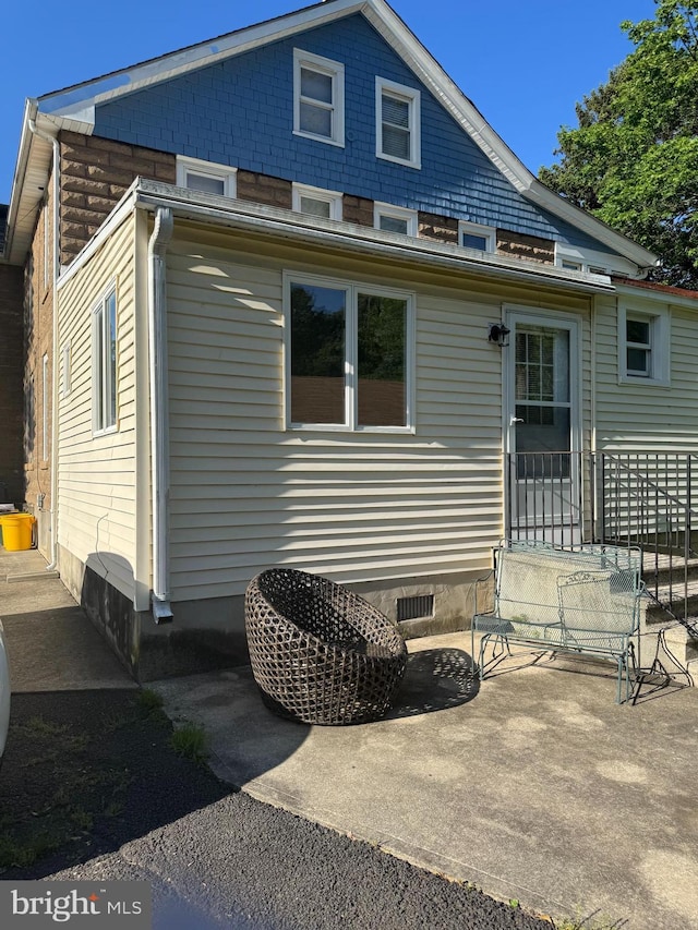 73 Fairfield Ave, Lawrence, NJ 08648 - rear view of house featuring crawl space and a patio