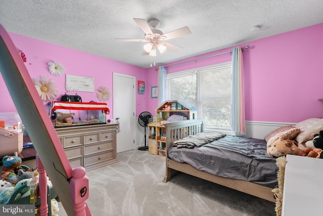 27073 Carrie Ct, Mechanicsville, MD 20659 - carpeted bedroom featuring a textured ceiling and a ceiling fan