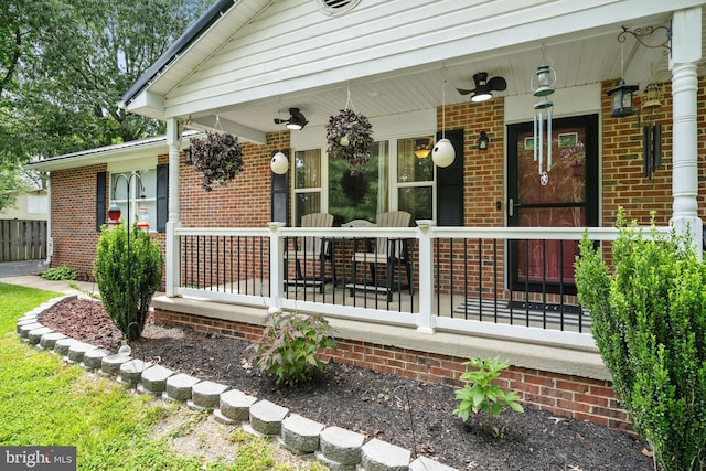 27073 Carrie Ct, Mechanicsville, MD 20659 - entrance to property with brick siding, covered porch, and a ceiling fan