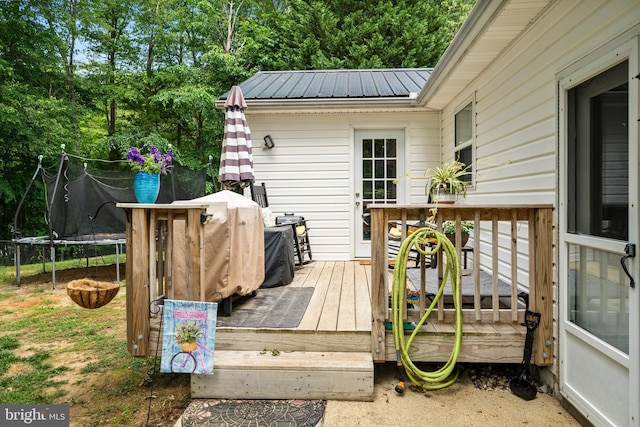 27073 Carrie Ct, Mechanicsville, MD 20659 - wooden deck with a trampoline