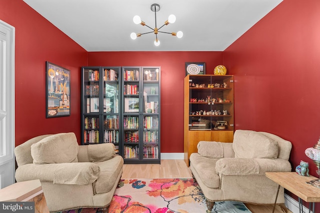 11111 Willow Bottom Dr, Columbia, MD 21044 - sitting room with wood finished floors and a chandelier