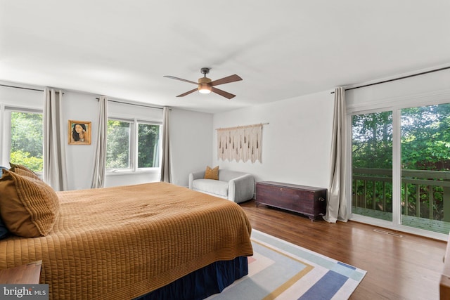 11111 Willow Bottom Dr, Columbia, MD 21044 - bedroom featuring access to outside, wood finished floors, and a ceiling fan