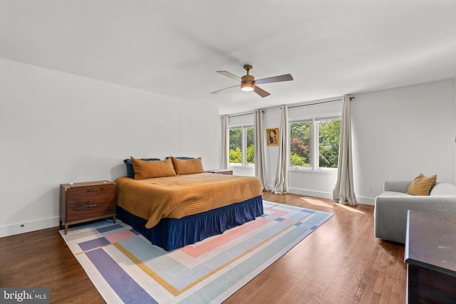 11111 Willow Bottom Dr, Columbia, MD 21044 - bedroom featuring wood finished floors, baseboards, and a ceiling fan