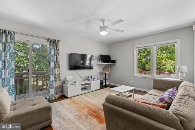 11111 Willow Bottom Dr, Columbia, MD 21044 - living area with wood finished floors, ceiling fan, and baseboards