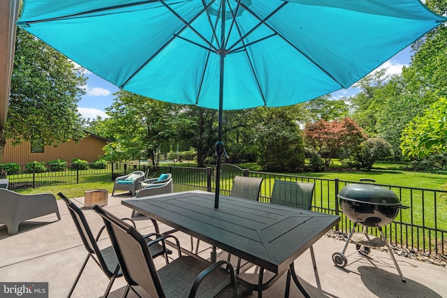 11111 Willow Bottom Dr, Columbia, MD 21044 - view of patio featuring outdoor dining space and view of wooded area