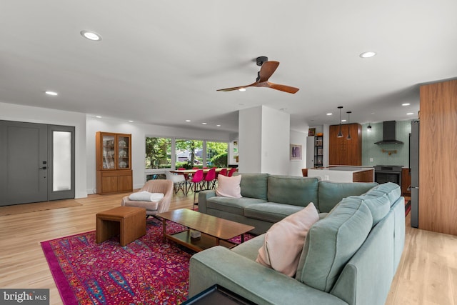 11111 Willow Bottom Dr, Columbia, MD 21044 - living room with recessed lighting, light wood-style floors, and a ceiling fan
