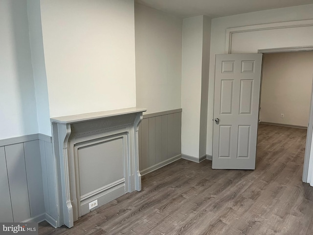 3 Third St, Pottstown, PA 19464 - spare room featuring a wainscoted wall, wood finished floors, and a decorative wall