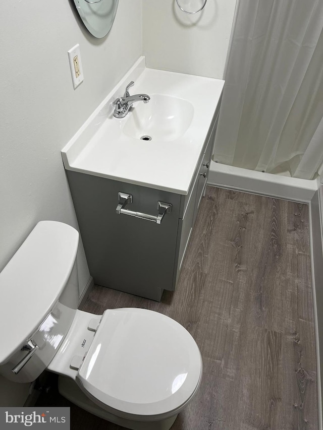 3 Third St, Pottstown, PA 19464 - full bathroom with toilet, vanity, a shower with curtain, and wood finished floors