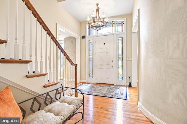 826 Bent Creek Dr, Lititz, PA 17543 - entryway with wood finished floors, stairs, a chandelier, and baseboards
