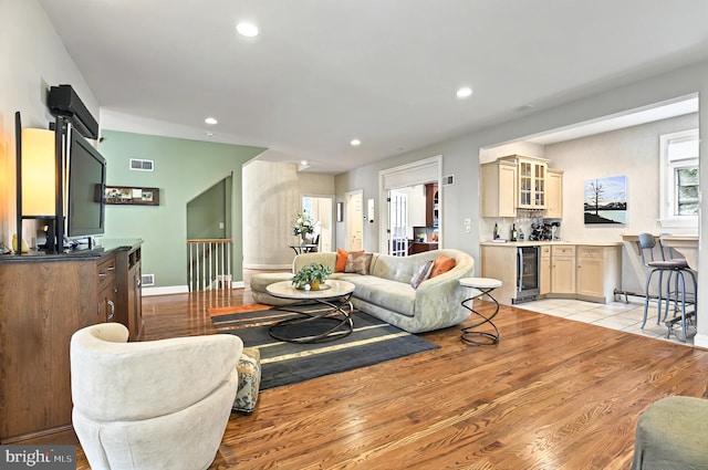 826 Bent Creek Dr, Lititz, PA 17543 - living room featuring wine cooler, recessed lighting, light wood-type flooring, baseboards, and a barn door