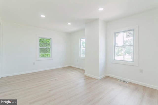 395 Main St, Cedarville, NJ 08311 - empty room featuring plenty of natural light, light wood-style floors, recessed lighting, and baseboards