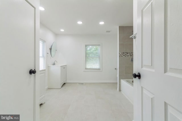 395 Main St, Cedarville, NJ 08311 - bathroom featuring plenty of natural light, tile patterned floors, vanity, recessed lighting, and shower / tub combination
