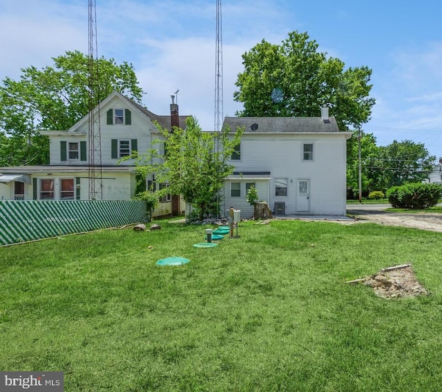 395 Main St, Cedarville, NJ 08311 - rear view of property featuring a chimney
