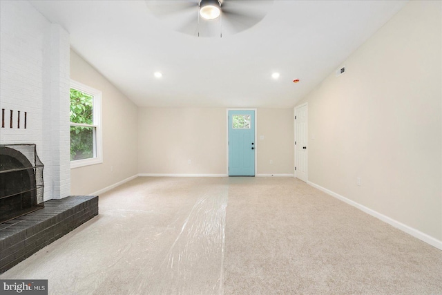 214 Kennard Ave, Edgewood, MD 21040 - unfurnished living room featuring baseboards, ceiling fan, light carpet, recessed lighting, and a brick fireplace