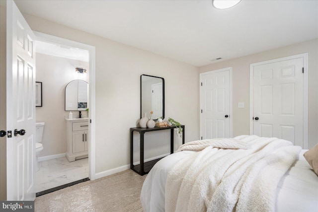 214 Kennard Ave, Edgewood, MD 21040 - bedroom featuring light marble finish floors, baseboards, and ensuite bathroom